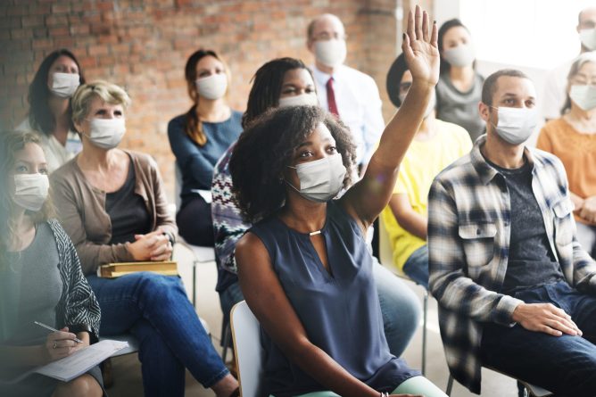 People wearing mask during workshop in the new normal